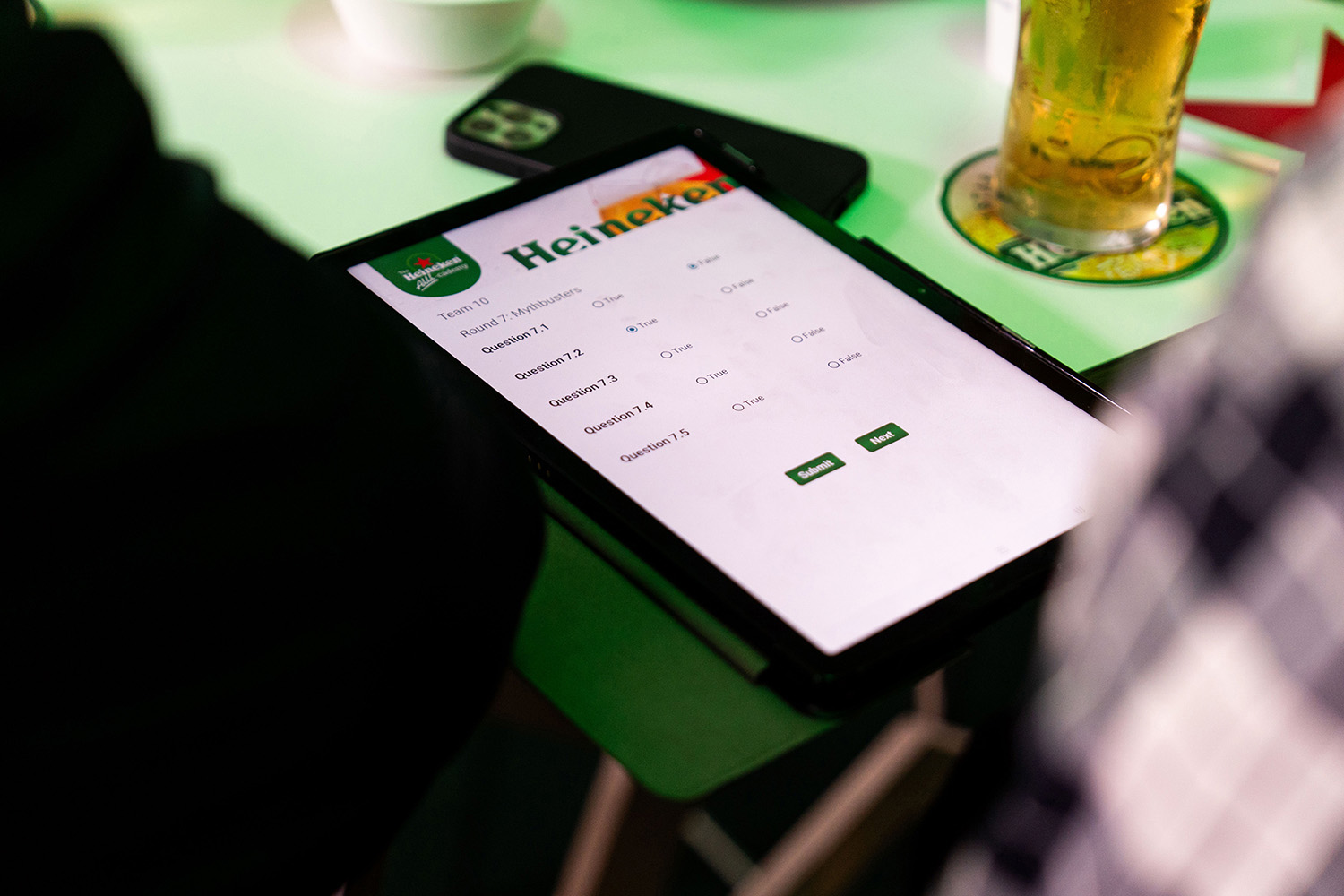 Heineken Ahhh‑cademy quiz interface on a tablet
